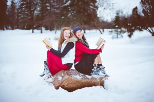 Friends reading together