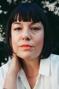 Nina LaCour is the author of Meet Me in the Garden